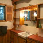 A full bathroom right next to the bedrooms.